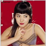 <b>cf</b>촬영 송혜교, 조막만한 인형 이목구비가 부러워~