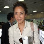 부산영화제에 참석하기 위해 도착한 김정은, <b>인중</b>만 보여