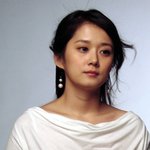 광고 <b>촬영</b>중인 장나라, 흰 천 걸치고..