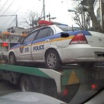 <b>견인</b>당하는 경찰차