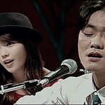 산 아이유가 죽은 김광석과 ‘생사 <b>이은</b> 합동공연’