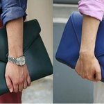 요즘 많이들 들고다니는 이 손가방은 무엇이죠 ?