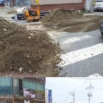 가게 앞에 흙을 쌓아두는 맑은물사업소....