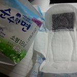 <b>순수</b>한면 생리대 검은색 이물질......