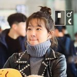 곰인형 안고 입국하는 곰슬기