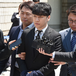 포승줄에 묶인채 끌려가는 <b>승리</b>