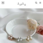 [스키즈] 북극곰 <b>후원</b> 귀걸이에 이어서