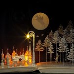 동화 속 순간을 책 위에 펼치면..