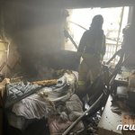 대낮 아파트 11층서 화재…<b>주민</b> 19명 대피 소동