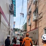 투신한 여성이 전깃줄에 걸려 목숨 건져