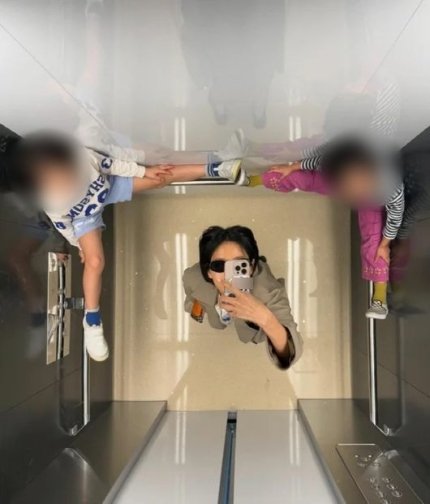 김나영 아이들 엘리베이터사진